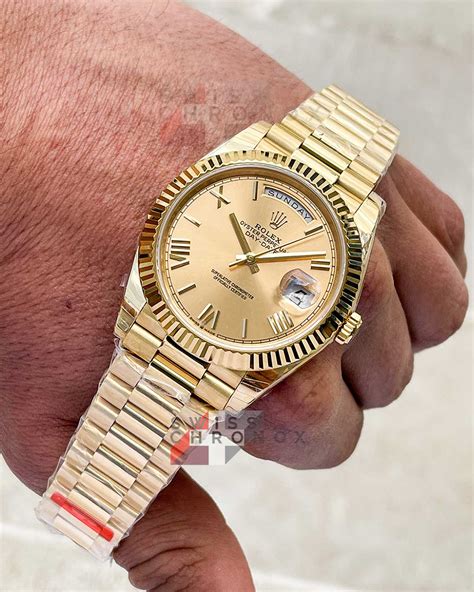 rolex day date 40 yellow gold flutteddial